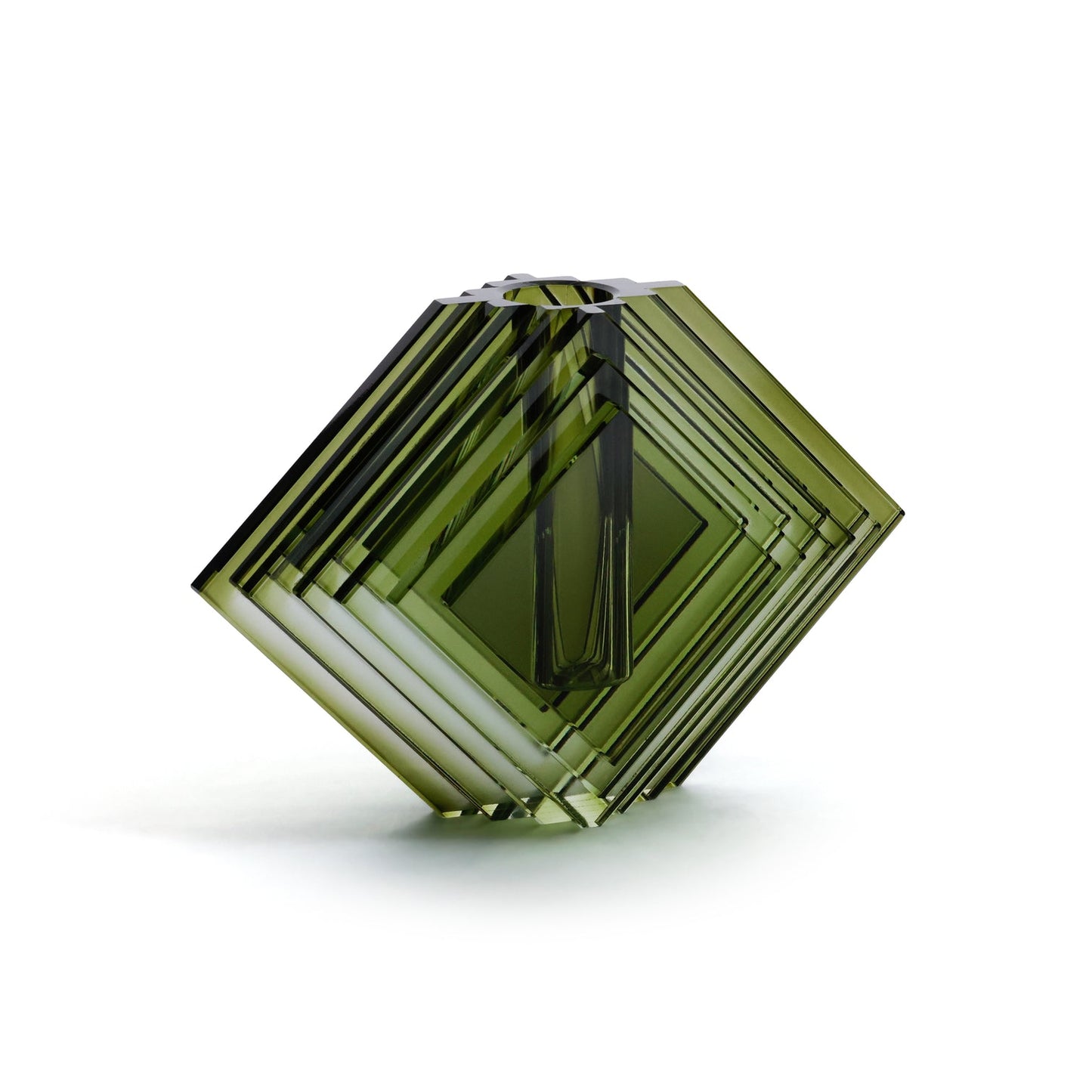 Hexagonal green crystal on a white background