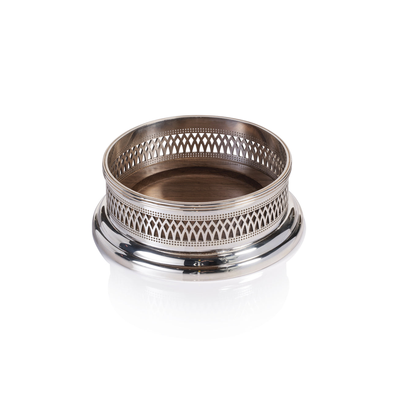 Silver decorative bowl with intricate patterns on a white background