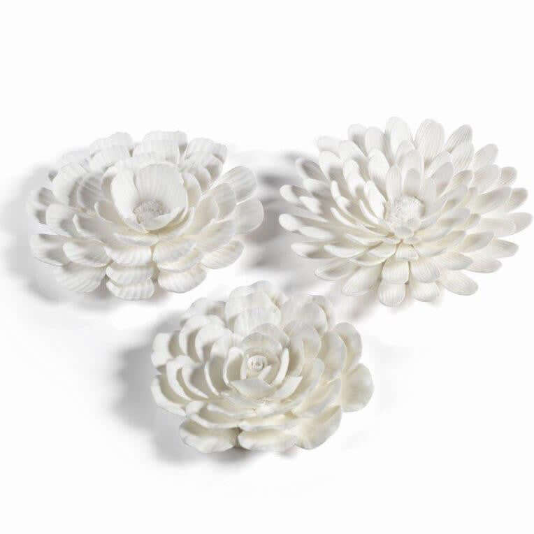 Porcelain decorative flowers arranged artistically, showcasing the intricate craft of Porcelain.