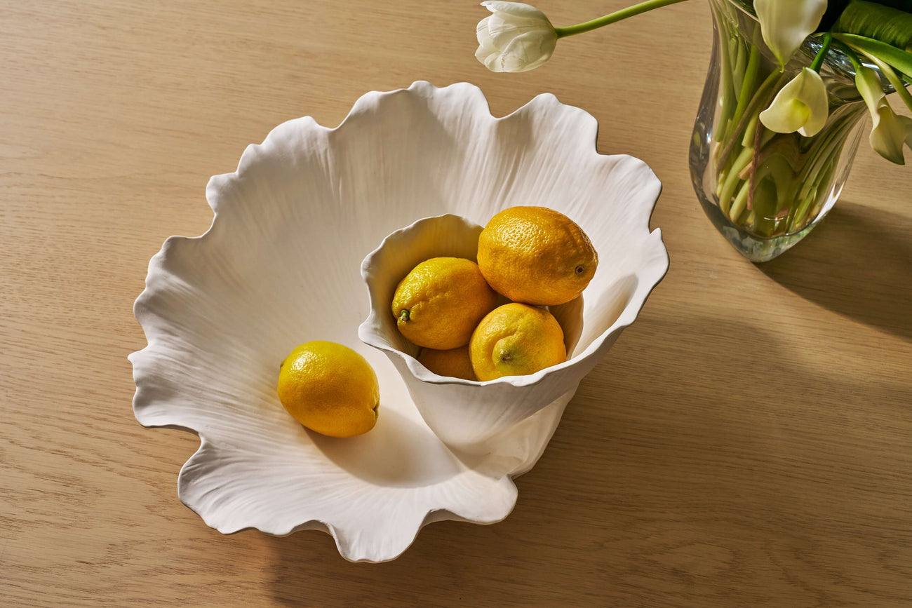 Decorative Accessories featuring a stylish white bowl filled with lemons, perfect for enhancing home decor.