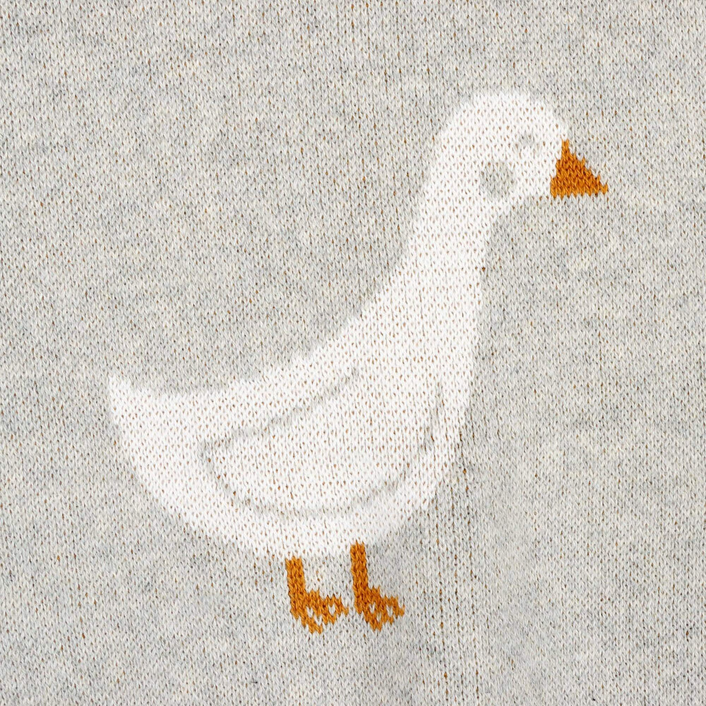 Duck Waddle - Organic Jacquard Knit Baby Blankets featuring a charming duck motif in soft colors.