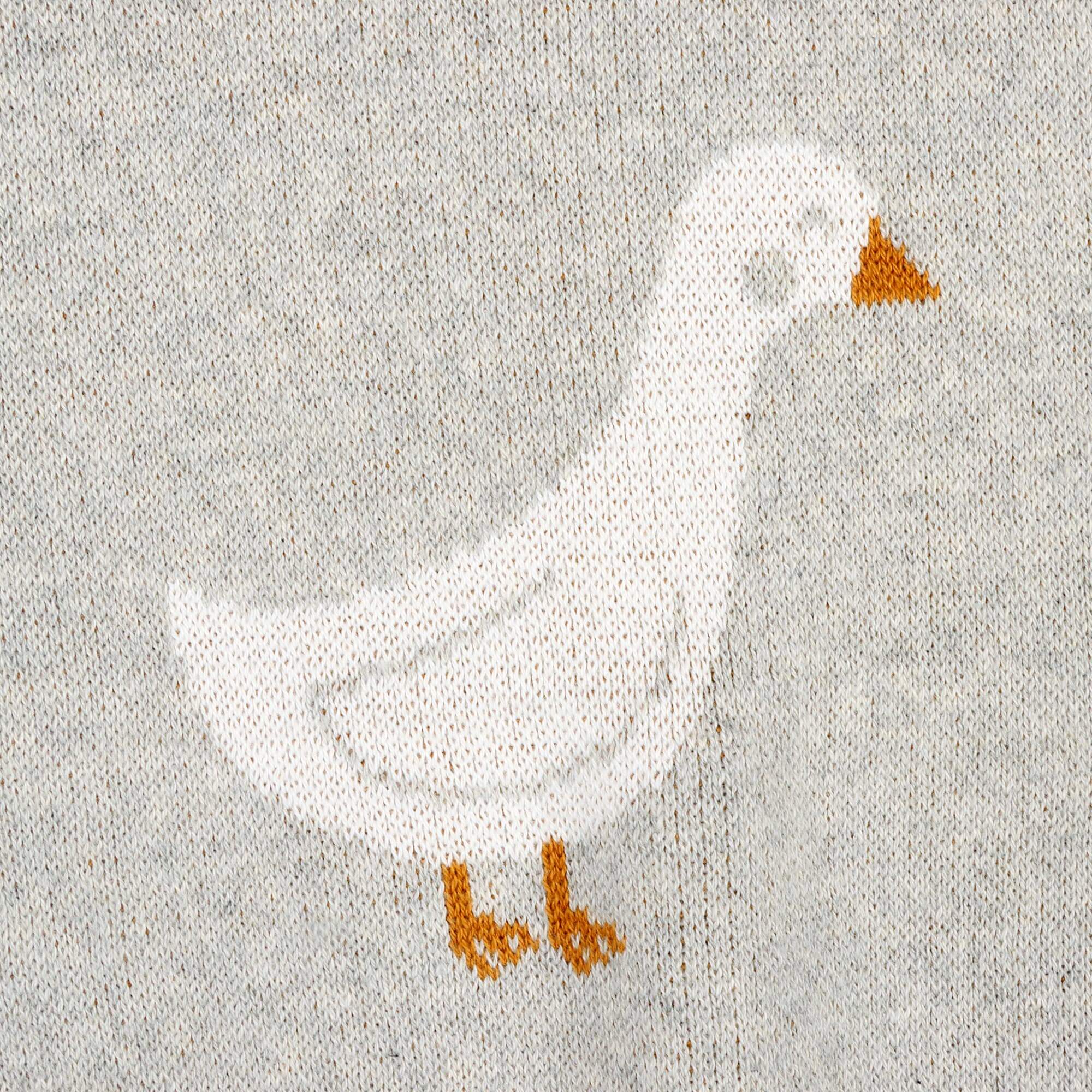 Duck Waddle - Organic Jacquard Knit Baby Blankets featuring a charming duck motif in soft colors.