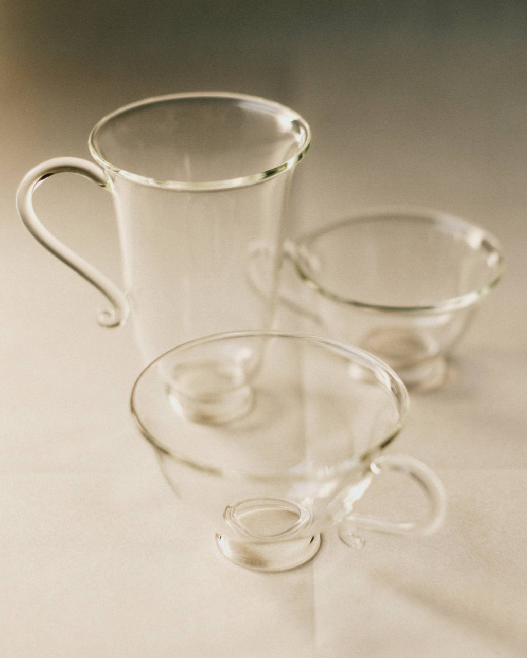 Petite Tasse, Clear (Set of 2) glass teacups showcasing elegant design and feminine silhouette.