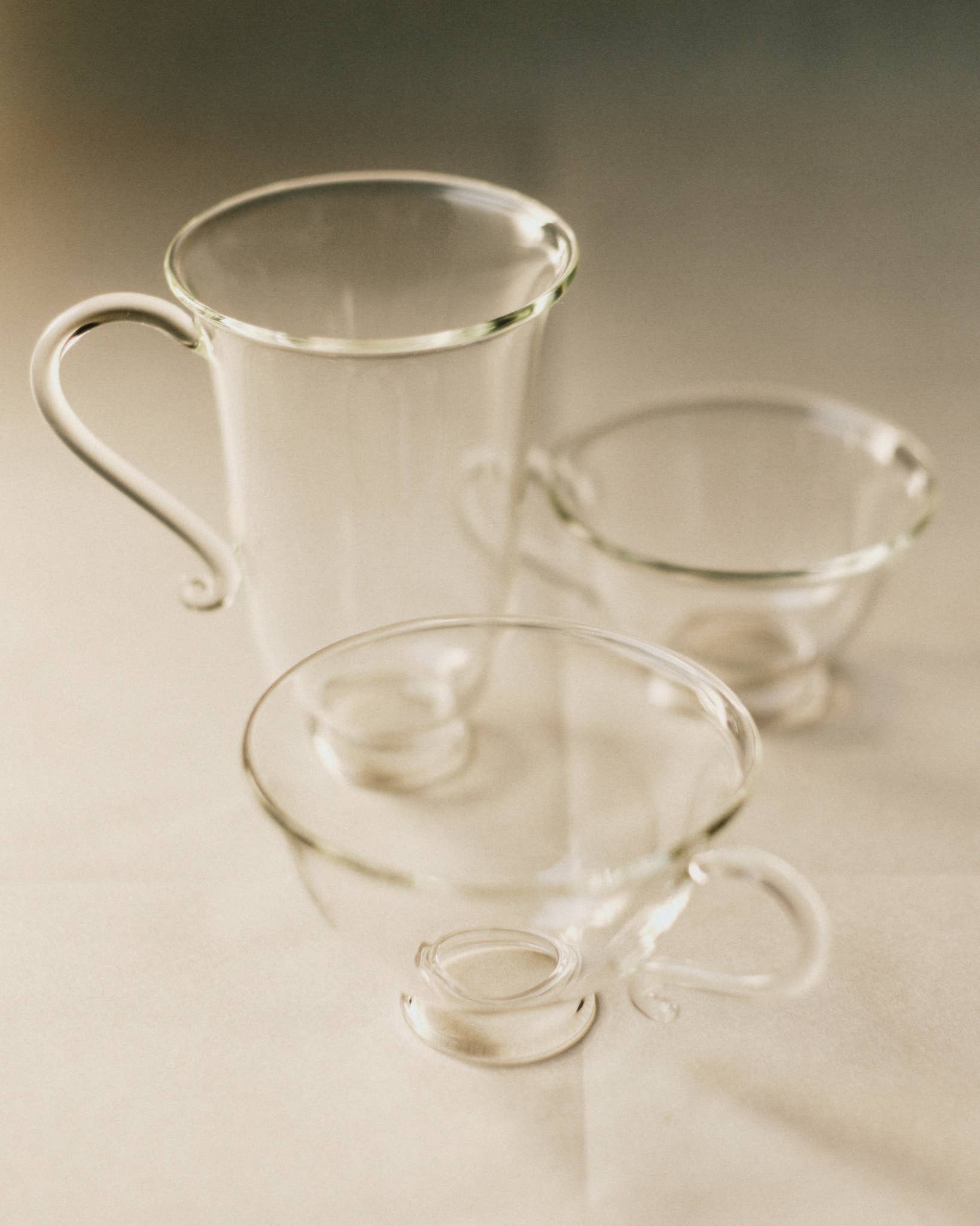 Petite Tasse, Clear (Set of 2) glass teacups showcasing elegant design and feminine silhouette.