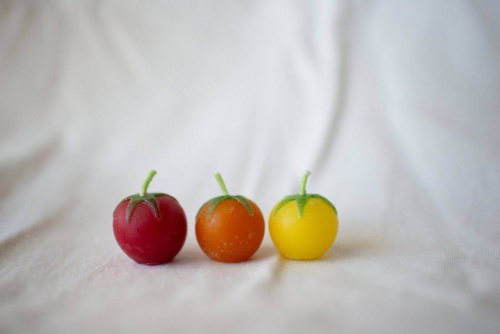 Cherry Tomato Beeswax Birthday Candles 8-count in vibrant red, orange, and yellow shapes.