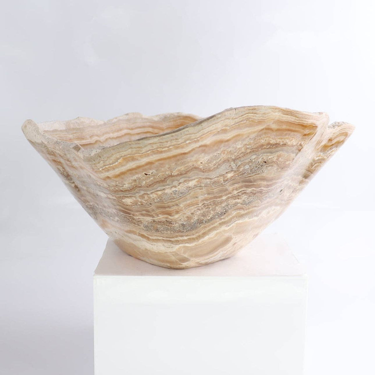 Mexican Onyx/Calcite Bowl 16" showcasing its unique, warm bands of amber and honey tones, hand-carved and exquisite.
