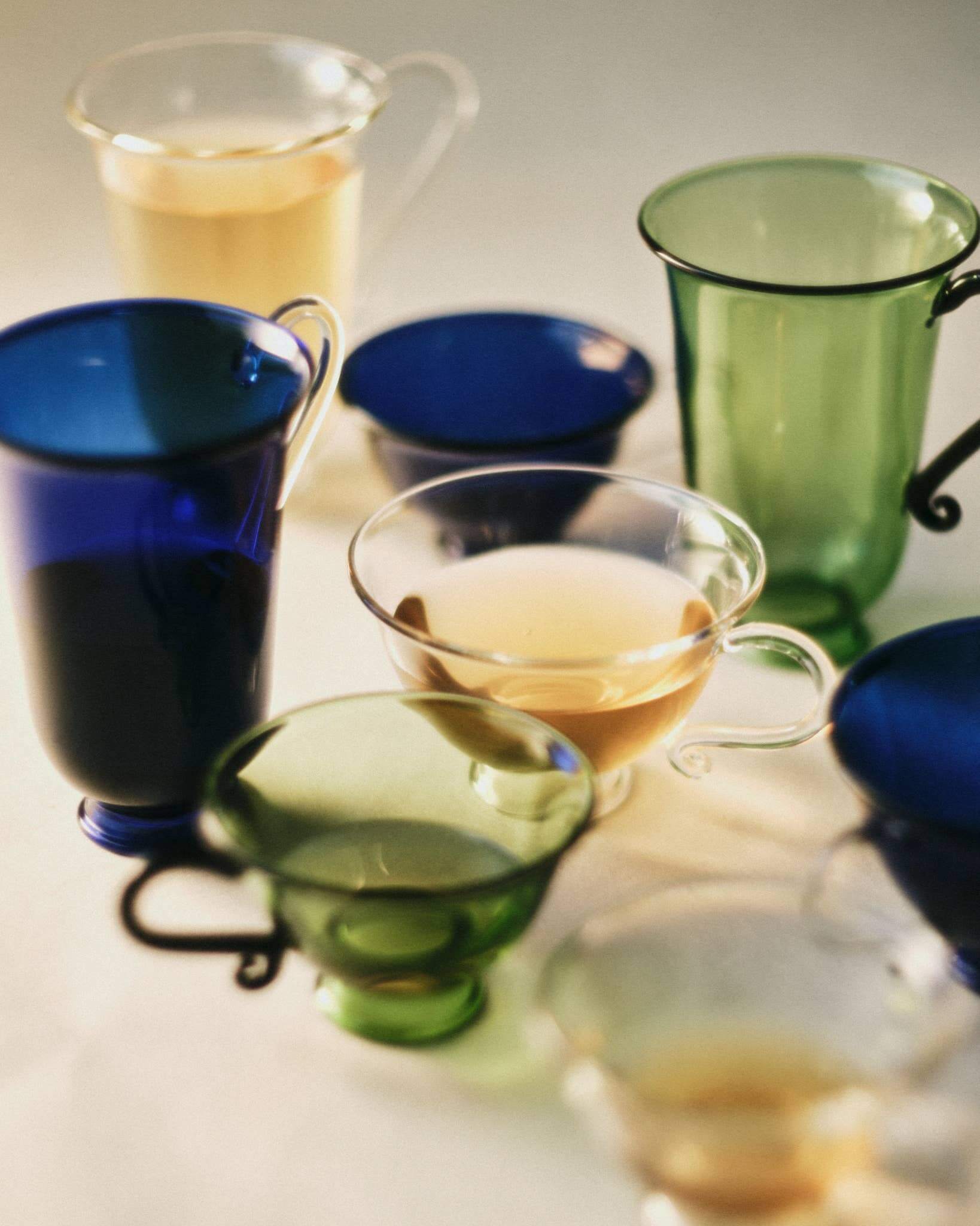 Petite Tasse, Clear (Set of 2) in a stylish arrangement with colorful glass cups.