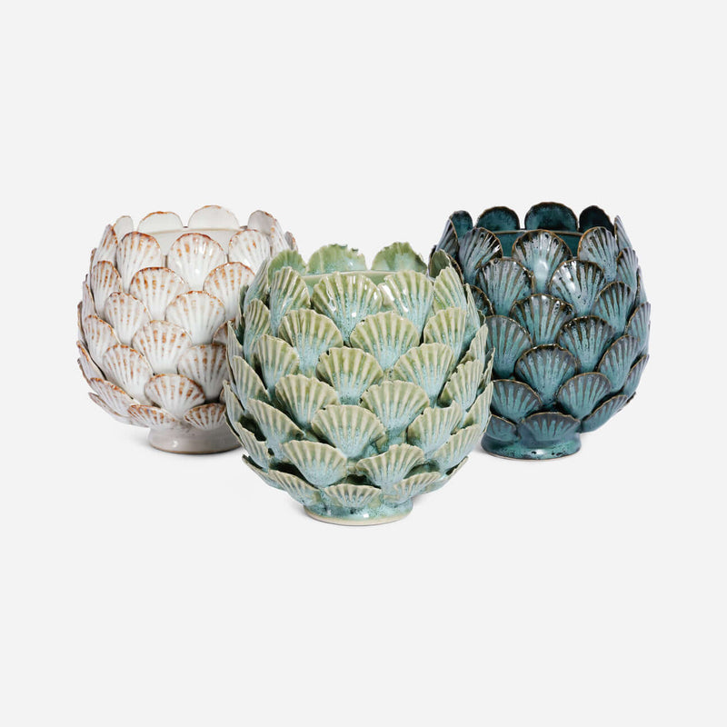 Scallop shell planter in assorted coastal-inspired colors for succulents, flowers, or decorative styling.