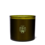 Heirloom Tomato Candle - 3-Wick in a hand-blown glass vessel with a floral logo.