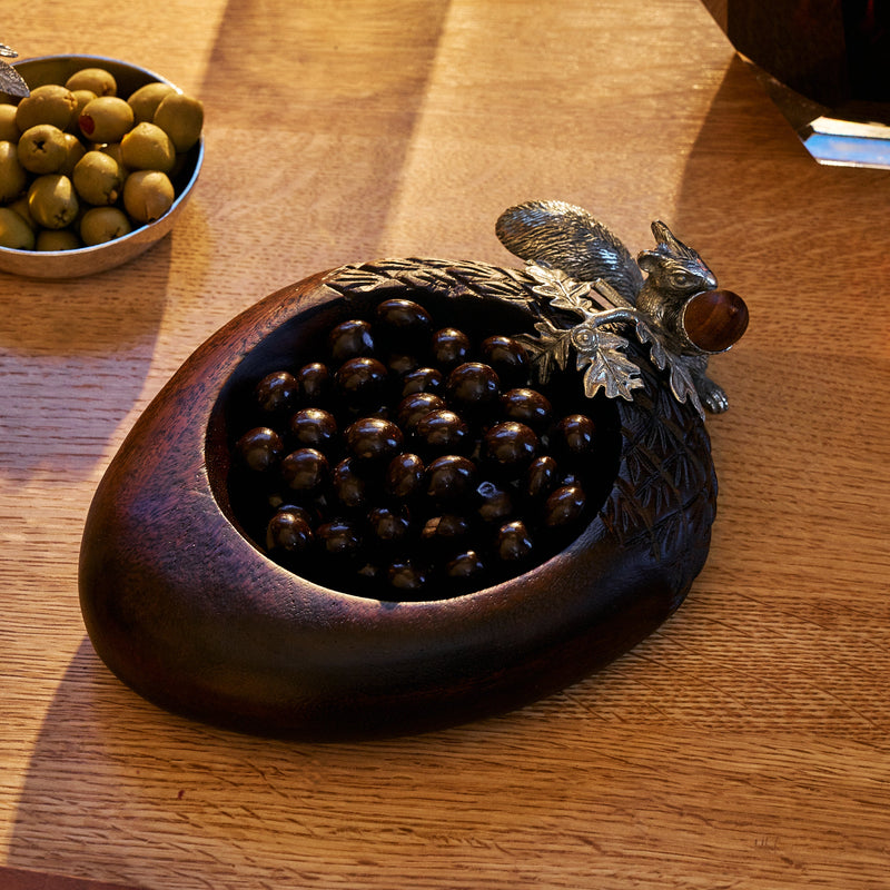 acorn nut bowl with chocolate covered nuts inside