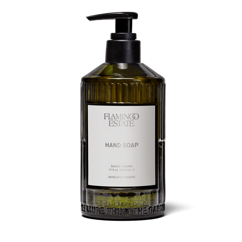 Heirloom Tomato Glass Hand Soap in a custom glass vessel by Flamingo Estate, elevating bathroom aesthetics.