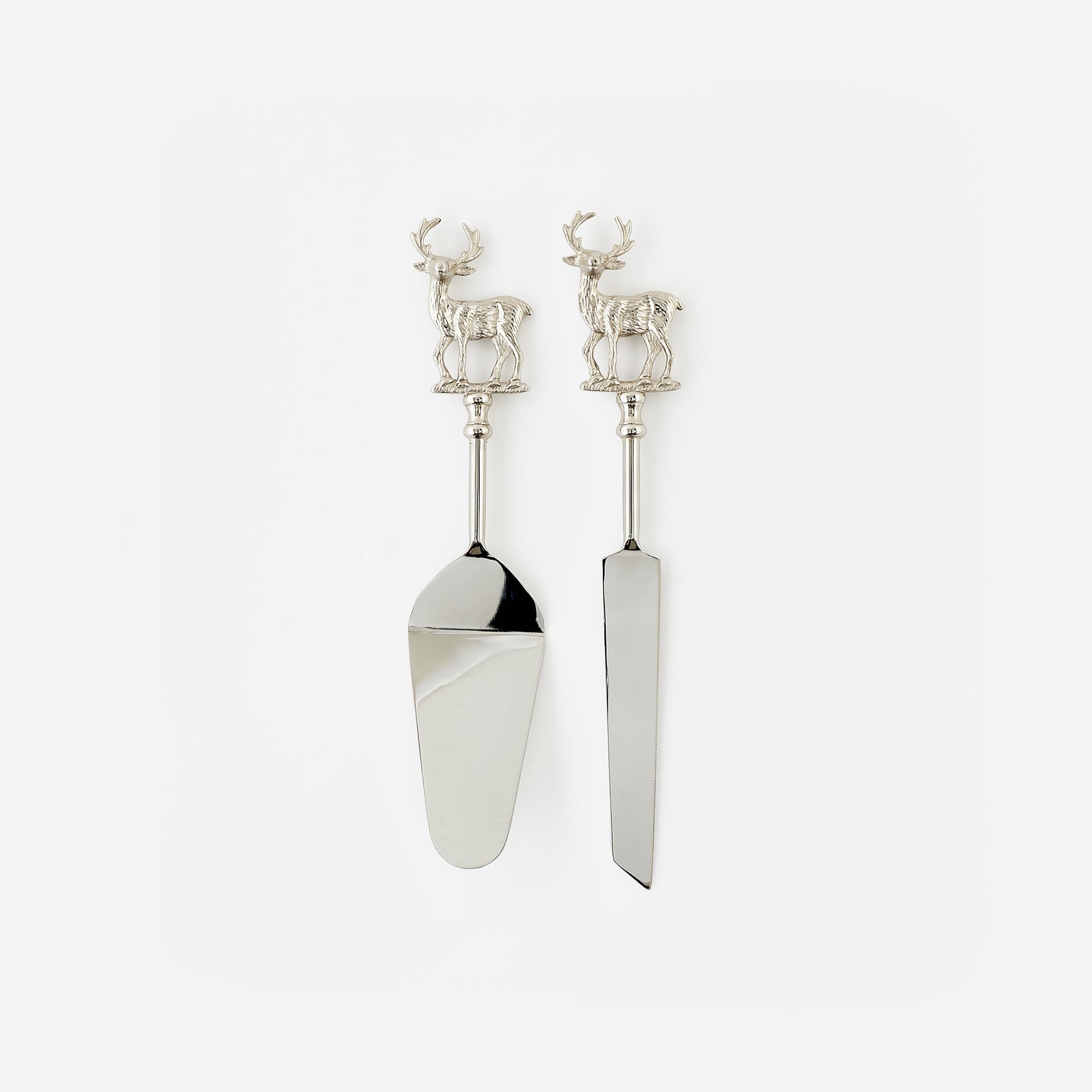 Silver cake server set with deer handles on a white background