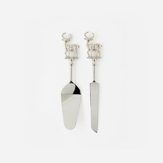 Silver cake server set with deer handles on a white background
