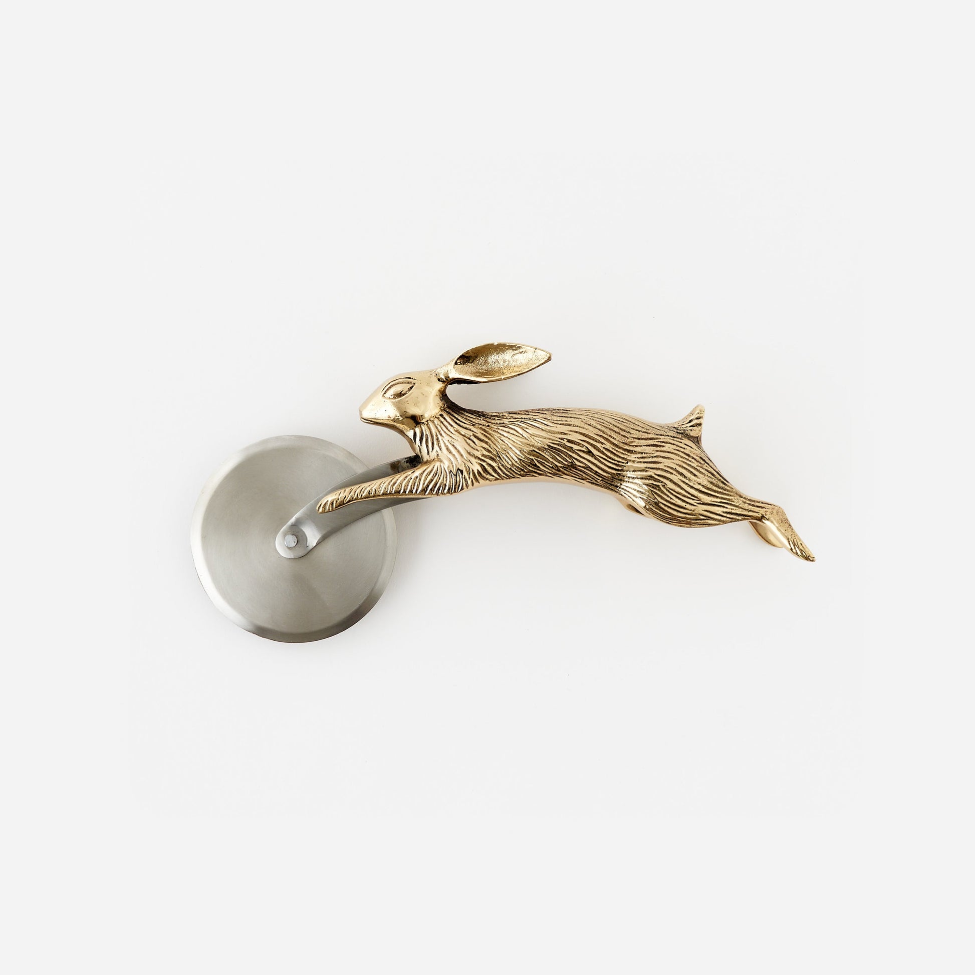 pizza cutter with a gold rabbit design on a white background