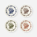 Turkey Scalloped Plates, Set of 4 featuring colorful turkey illustrations and a scalloped edge design.