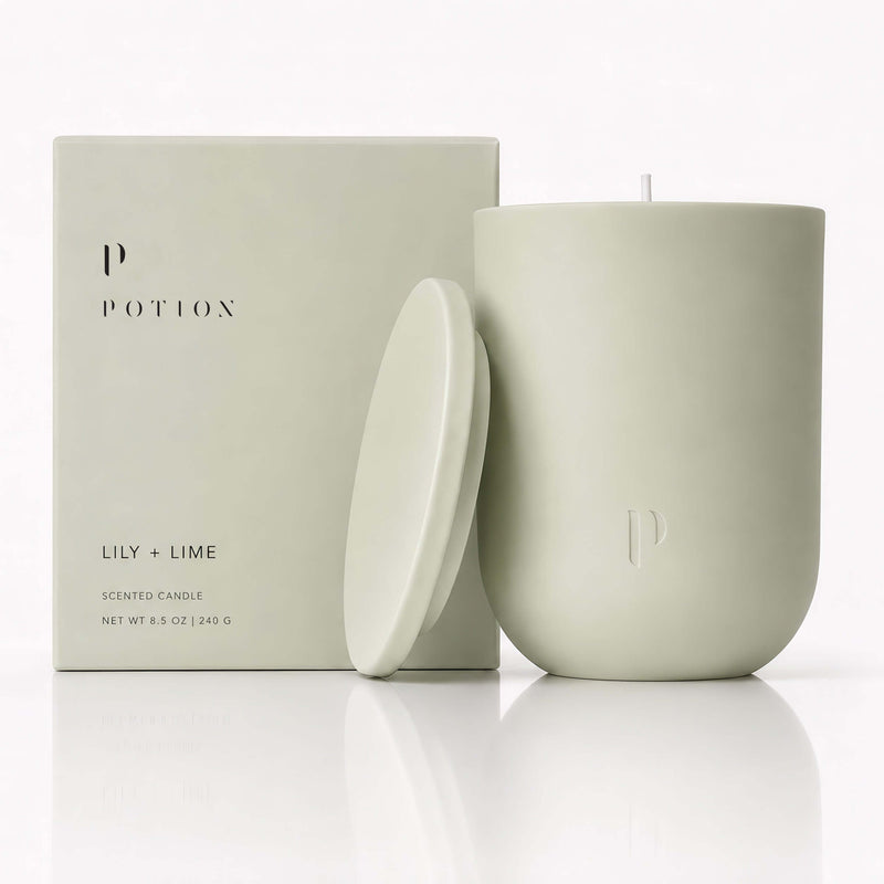 Lily + Lime Candle in matte green container with box, featuring fresh citrus scent and organic materials.