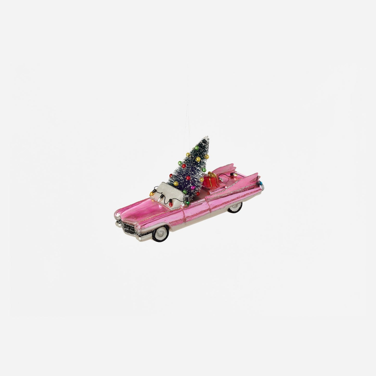 Oversized Pink Cadillac with Tree