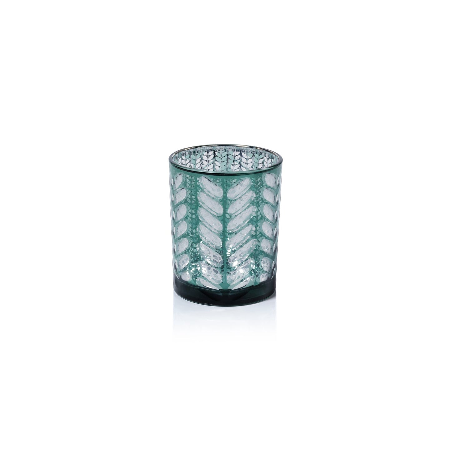 Decorative glass candle holder with leaf pattern on a white background