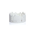White decorative basket with cut-out patterns on a white background