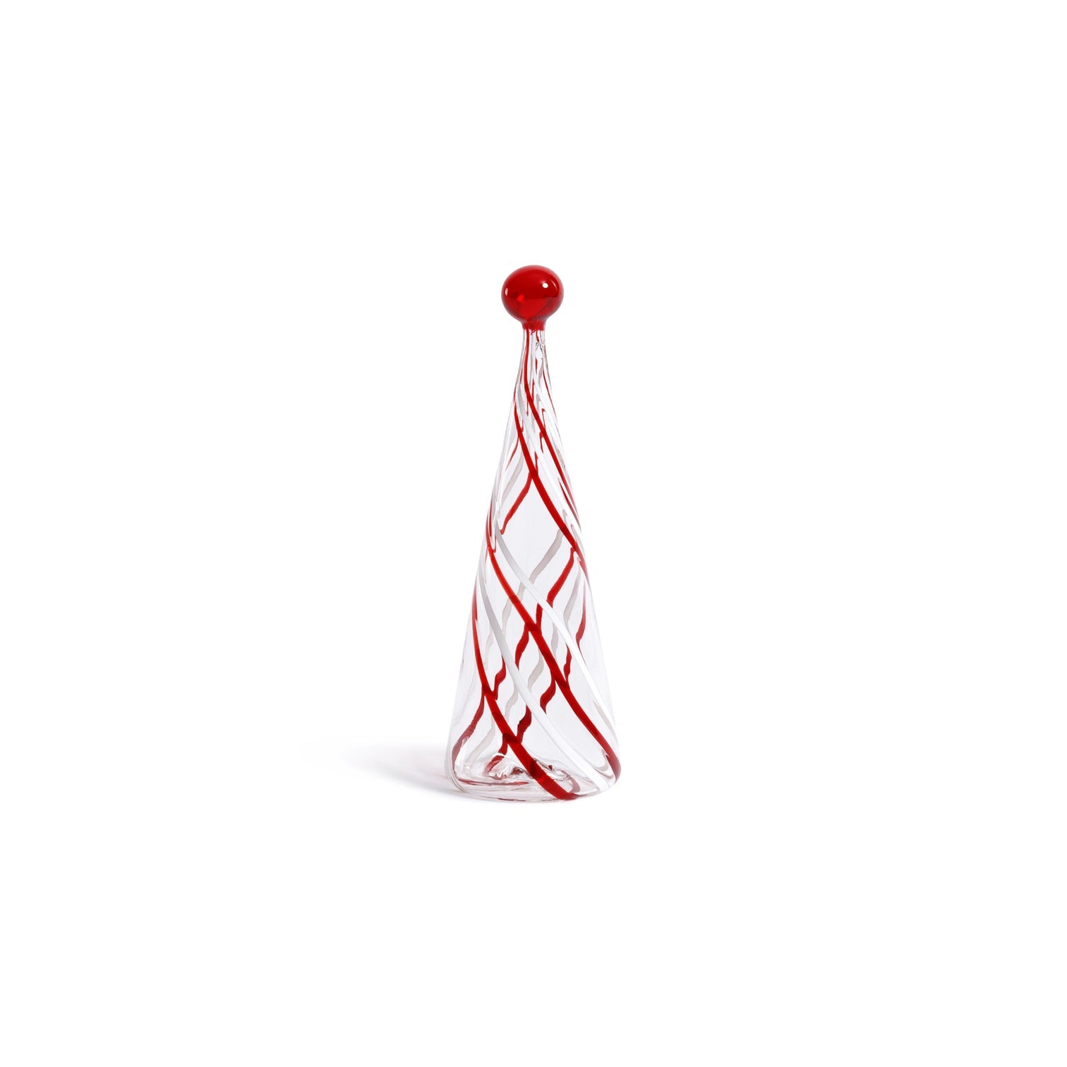 Decorative glass object with red and white pattern on a white background