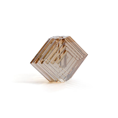 Hexagonal crystal-like object on a white background