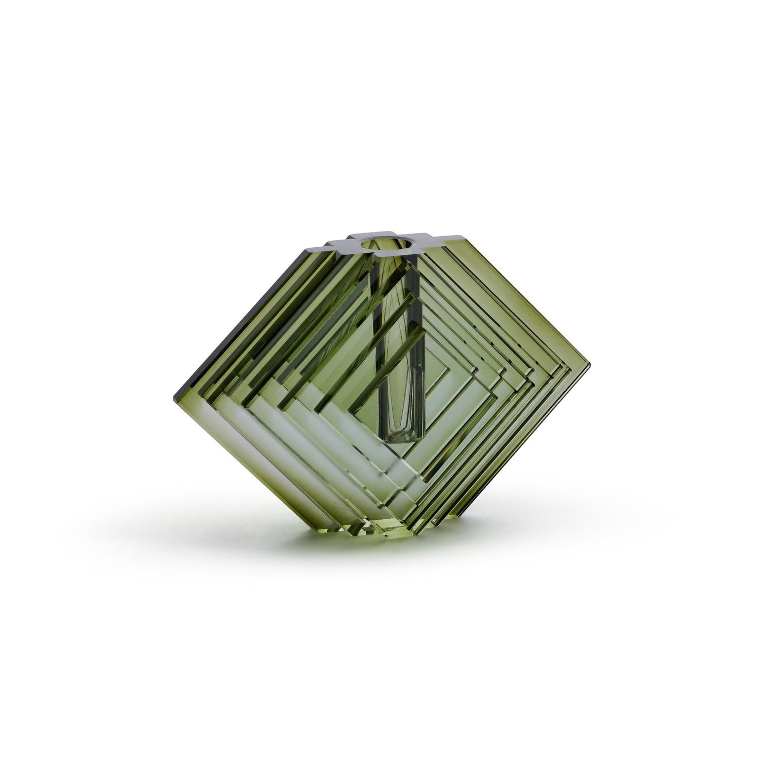 Green geometric crystal on a white background