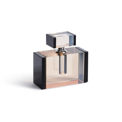 Perfume bottle with black and clear design on a white background