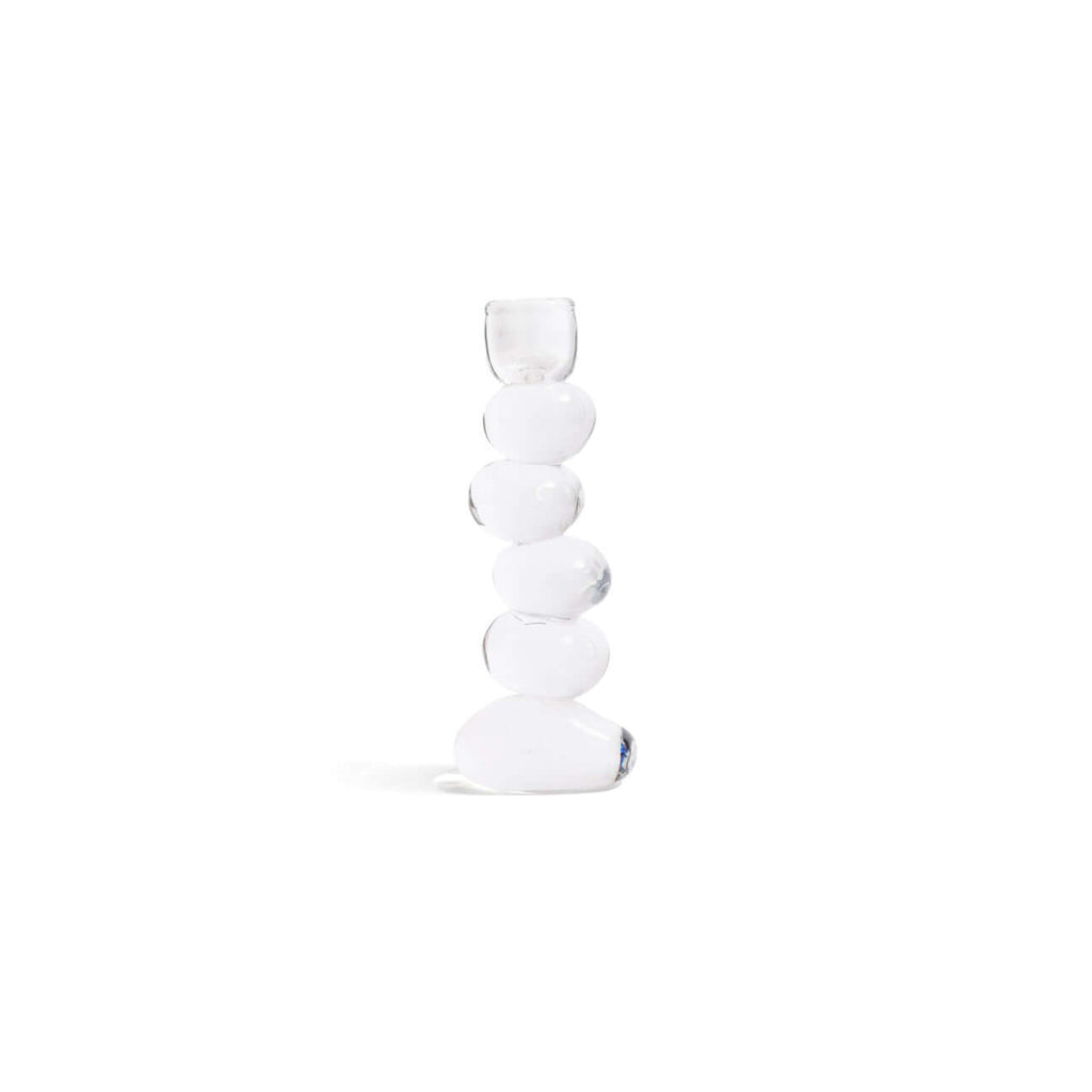 Ice Stone Glass Taper Holder showcasing clear glass with stacked organic pebble forms, perfect for elegant candlelight.
