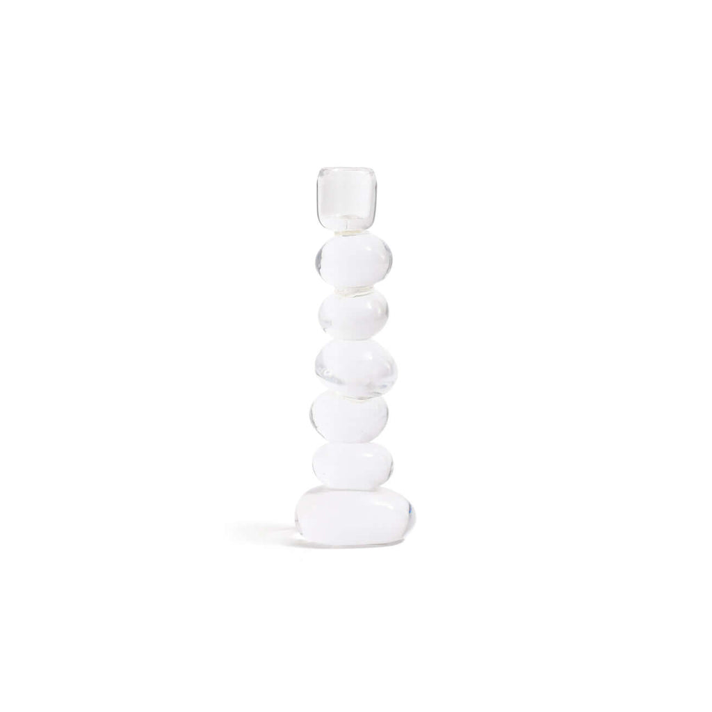 Ice Stone Glass Taper Holder in clear glass featuring stacked organic pebble forms for elegant candlelight decor.