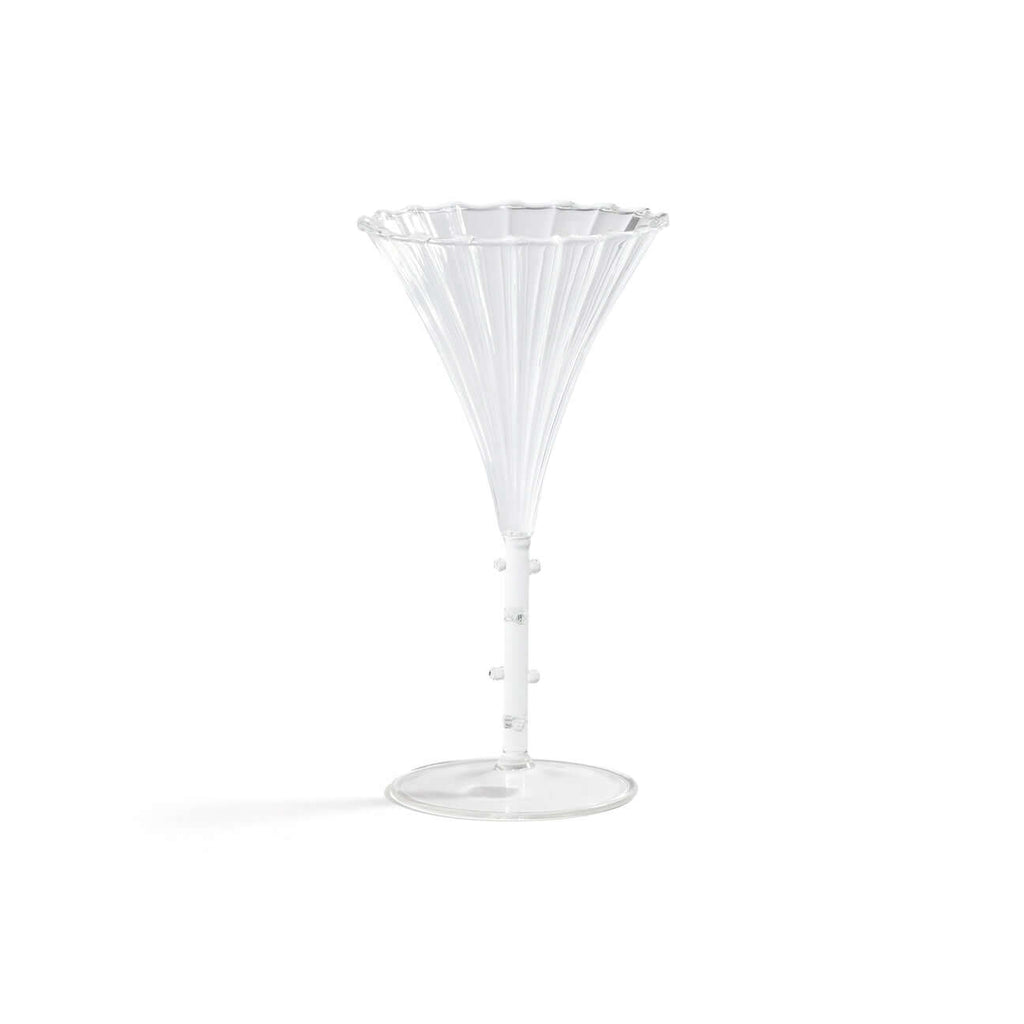 Clear martini glass on a white background