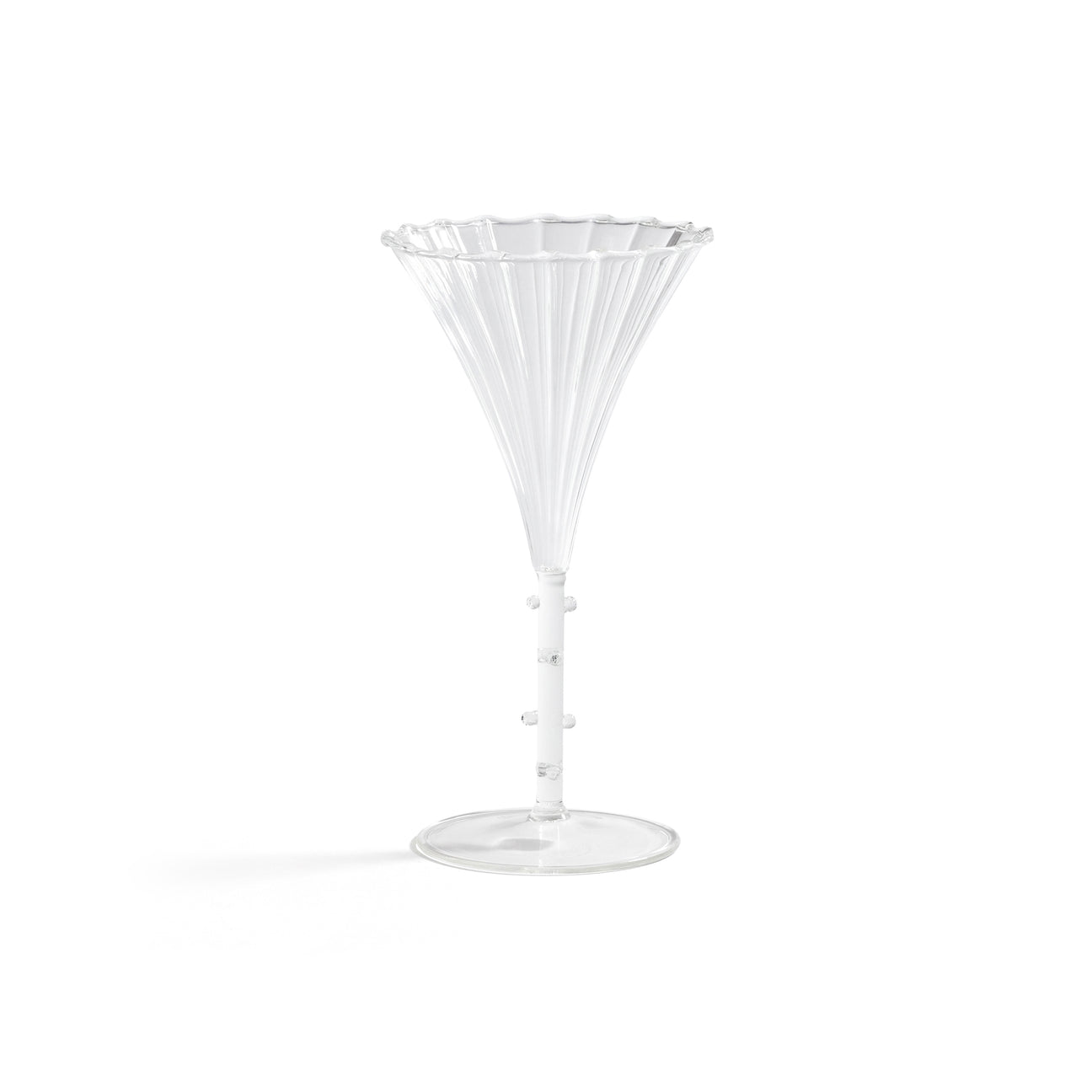 Clear martini glass on a white background