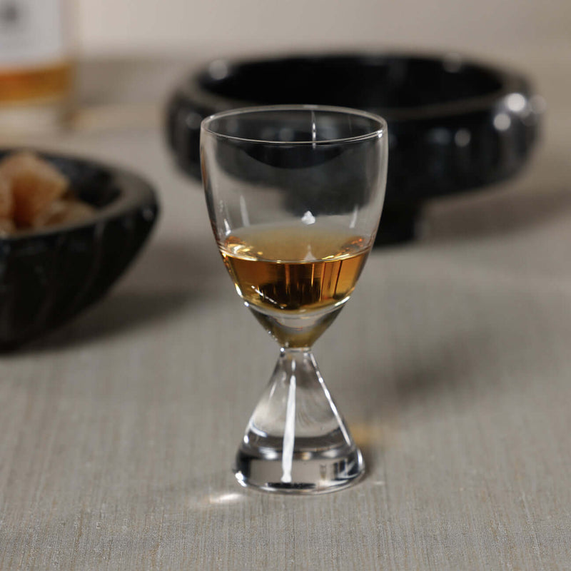 Timeless Sip Shot Glass (Set of 6) featuring a flared bowl and clear glass showcasing amber liquor.