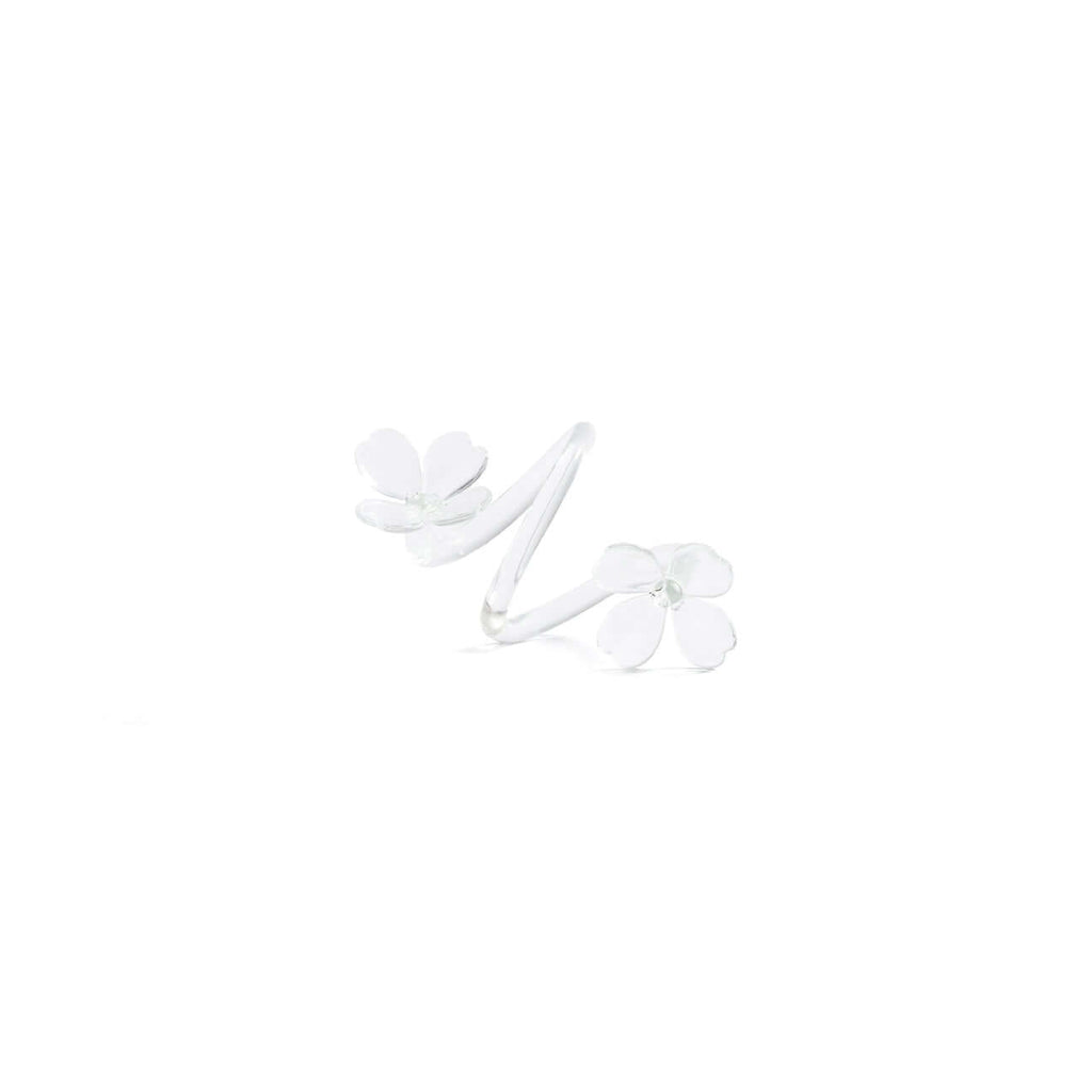 Four Botanica Glass Flower Napkin Rings - Boxed (Set of 4) with clear petals and whimsical design on a white background.