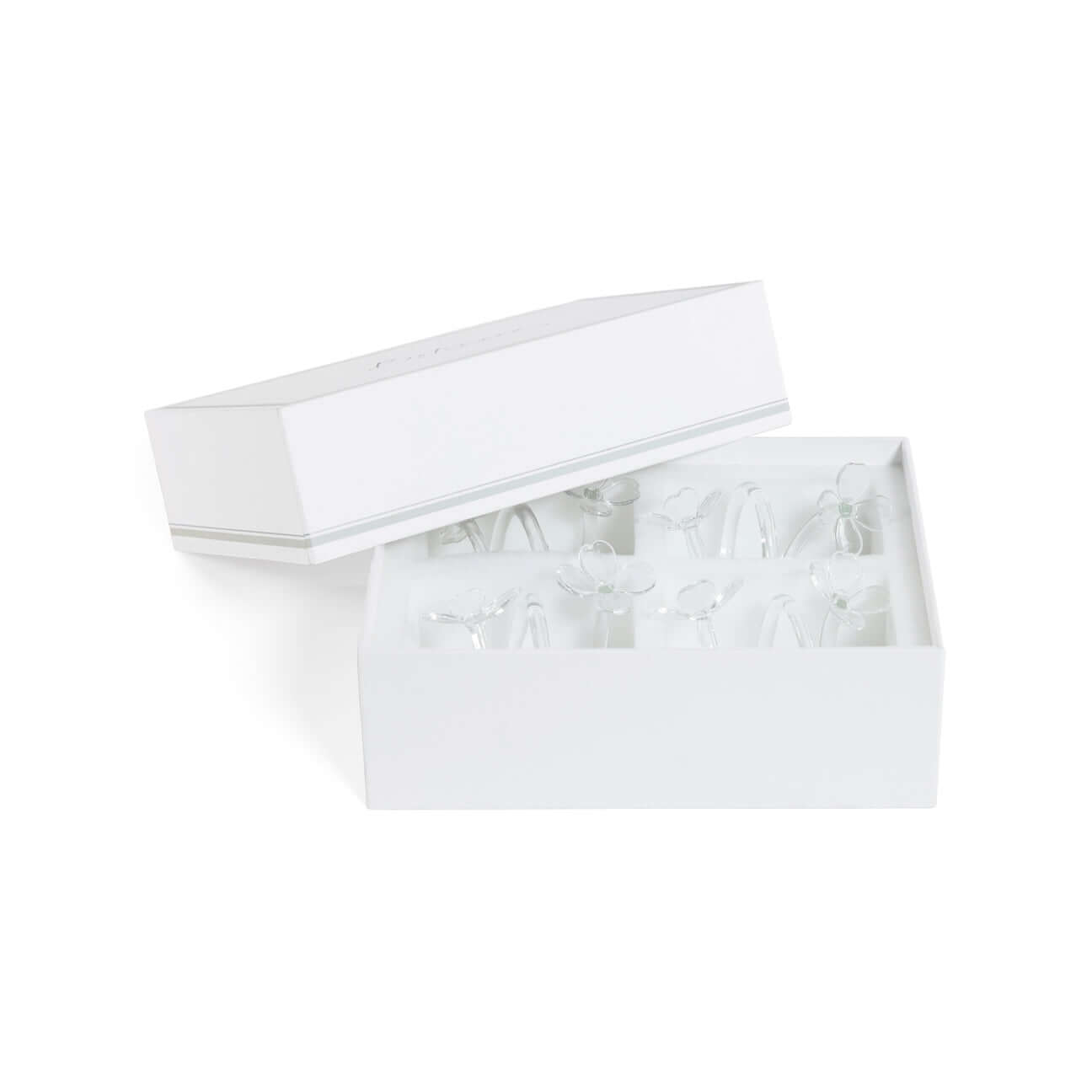 Four Botanica Glass Flower Napkin Rings - Boxed (Set of 4) in elegant packaging with delicate glass flowers inside.