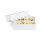 Four Botanica Glass Flower Napkin Rings - Boxed (Set of 4) in elegant packaging featuring delicate glass flower designs.