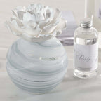 Petals Porcelain Diffuser - Large with marbled glass vessel and delicate porcelain flower.
