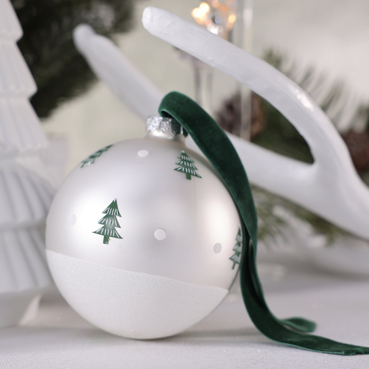 Matt White Glass Ornament with Scattered Trees