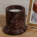 Marbella Scented Candle Jar with Cloche displayed on a wooden surface, showcasing natural marble design.