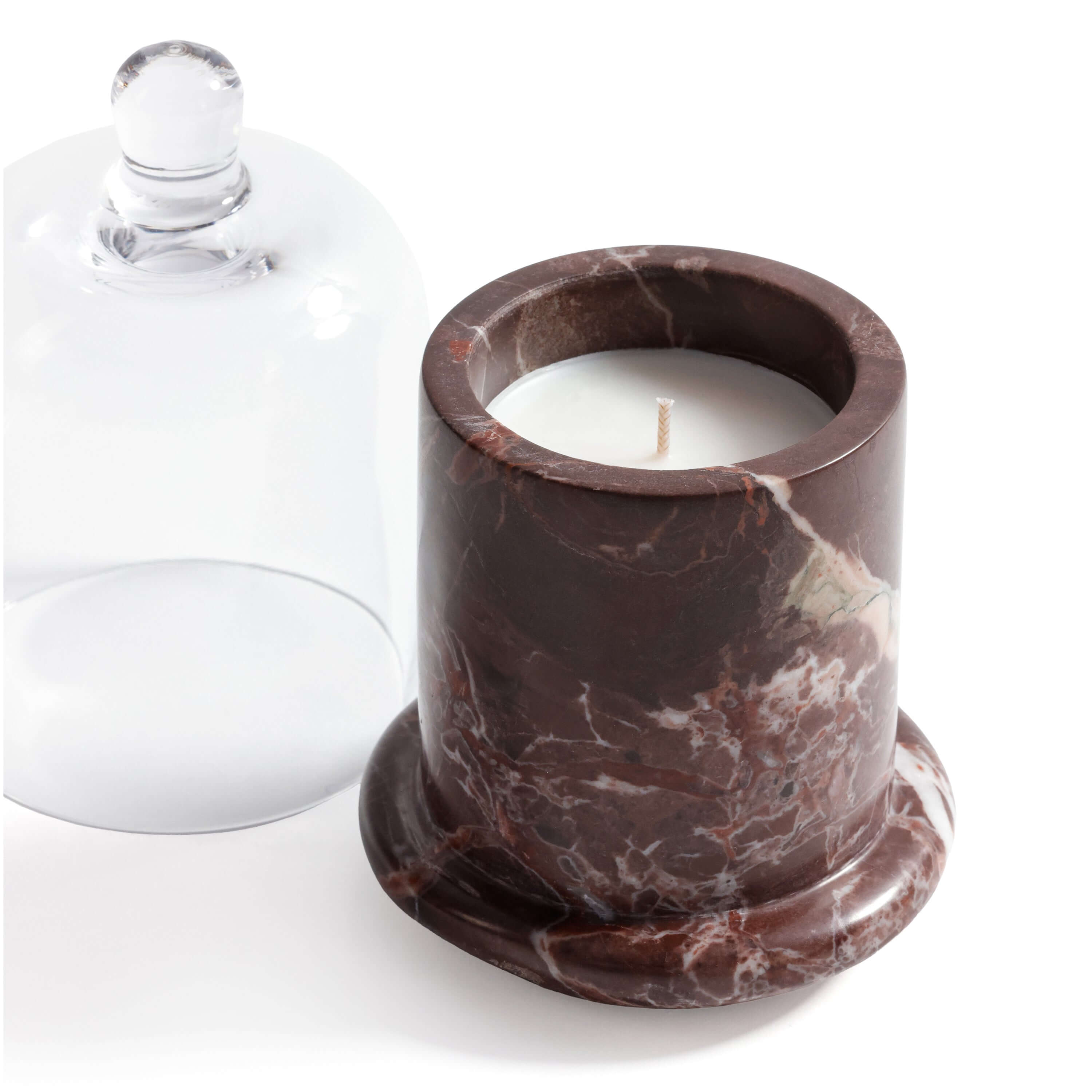 Marbella Scented Candle Jar with Cloche made of natural marble and topped with a glass cloche.
