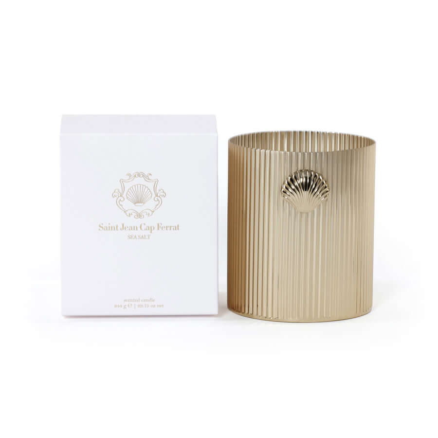 Cap Ferrat Fan Shell Design Candle in Gift Box elegantly presented with a gold textured vessel and white packaging.