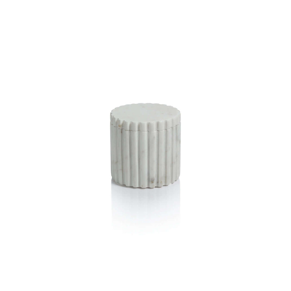 Camogli Bath Collection round canister with lid made from white marble, featuring sculpted vertical fluting design.