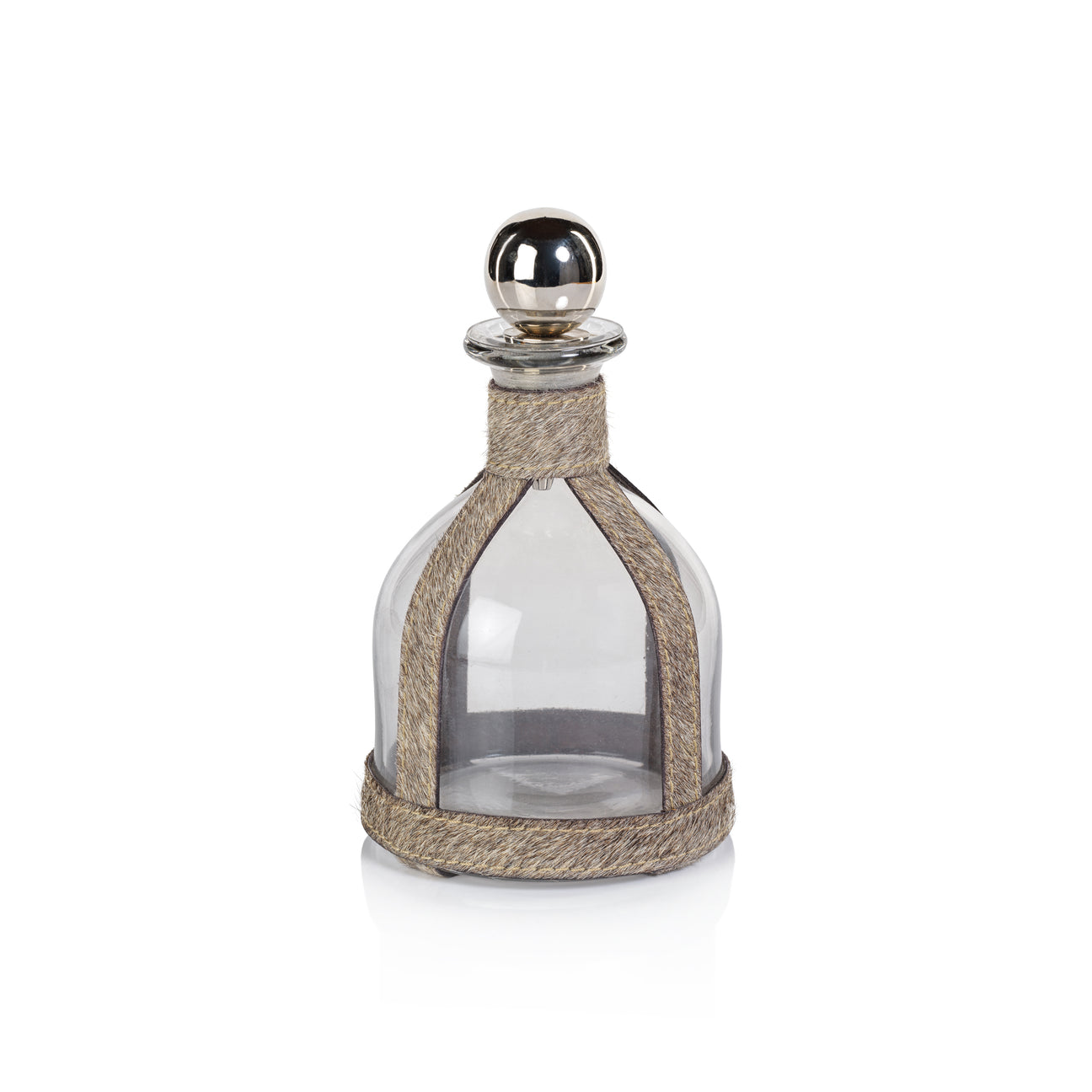 Decorative glass bottle with a silver cap on a white background