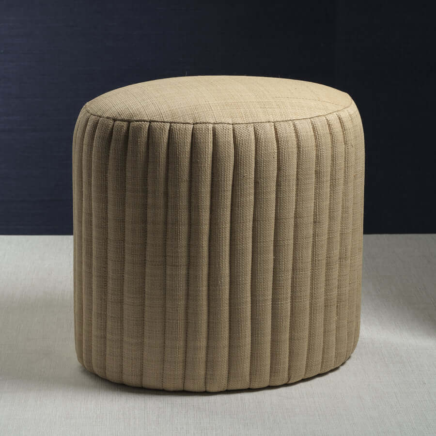Fontainebleau Oval Fluted Raffia Ottoman in natural woven raffia with vertical fluting for stylish home decor.