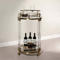 Opus Round Bar Cart / Trolley - Small with brass frame, acrylic legs, and wine storage.
