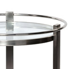 Élan Round Bar Cart / Trolley featuring a polished silver frame and clear glass top.