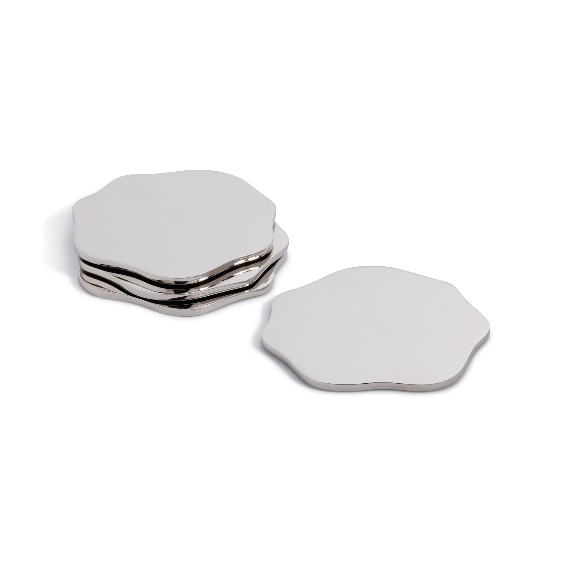 Set of silver hexagonal coasters on a white background