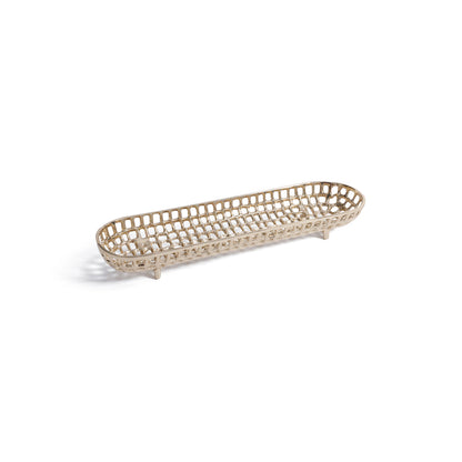 Woven bread basket on a white background