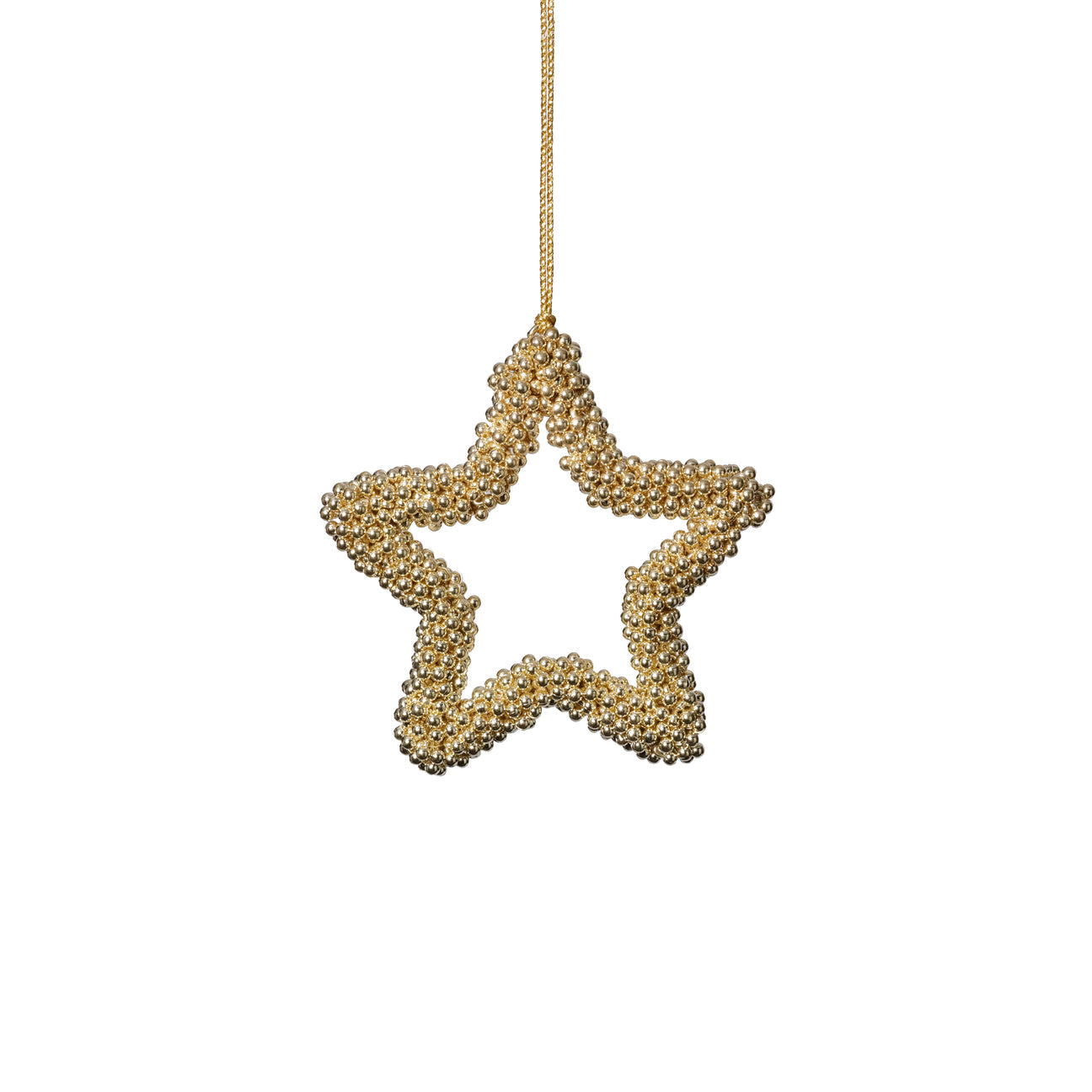 Gold star-shaped ornament hanging on a white background