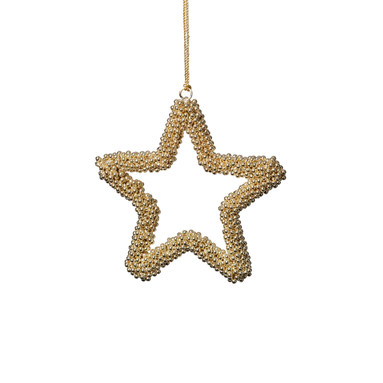 Gold star-shaped ornament on a white background