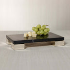 Roku Cheese and Charcuterie Marble Serving Tray featuring sleek black marble with stainless steel feet, perfect for appetizers.